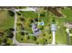 Aerial view of private estate featuring a sparkling pool and detached outbuilding at 10220 N Serenity Ln, Mooresville, IN 46158
