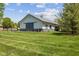 Large outbuilding with sliding doors and ample green space at 10220 N Serenity Ln, Mooresville, IN 46158