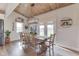 Charming dining room with wood-paneled ceiling and stylish light fixture at 10776 S 250 W, Flat Rock, IN 47234