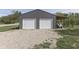 Ample parking with a two-car garage and a covered carport on a gravel drive at 10776 S 250 W, Flat Rock, IN 47234