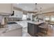 Spacious kitchen with white cabinetry, marble countertops, and modern appliances at 10776 S 250 W, Flat Rock, IN 47234