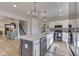 Bright, updated kitchen with stainless appliances, a kitchen island, and modern lighting at 10776 S 250 W, Flat Rock, IN 47234