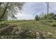 Expansive field with scattered trees and a view of the horizon, offering a sense of tranquility at 10776 S 250 W, Flat Rock, IN 47234