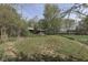 Beautiful landscape featuring a bridge, trees, and a grassy area, ideal for outdoor activities at 10776 S 250 W, Flat Rock, IN 47234