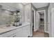 Modern bathroom featuring double sinks, vanity with quartz countertops, and a glass-enclosed shower at 1178 Turner Trace Pl, Avon, IN 46123
