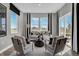 Inviting living room with decorative curtains, large windows providing natural light, and stylish seating arrangements at 1178 Turner Trace Pl, Avon, IN 46123