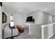 Cozy living area with gray walls, plush seating, television, and stylish decor for relaxation at 1178 Turner Trace Pl, Avon, IN 46123