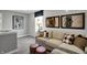 Comfortable living room featuring a neutral sofa, decorative pillows, and artistic wall decor at 1178 Turner Trace Pl, Avon, IN 46123