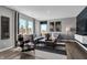 Bright living room featuring modern decor, large windows, and comfortable seating at 1178 Turner Trace Pl, Avon, IN 46123