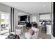 Bright and spacious living space with a dining area, lounge area, and access to outdoor seating at 1178 Turner Trace Pl, Avon, IN 46123