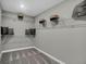 Spacious walk-in closet with wire shelving and plush gray carpeting at 1178 Turner Trace Pl, Avon, IN 46123
