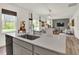 Open-concept kitchen with an island and view of the living area at 11925 Vale St, Indianapolis, IN 46235