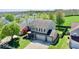 Desirable home with well-kept lawn, three-car garage, and neighborhood pond access at 1234 Yellowstone Way, Franklin, IN 46131