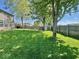 Lush backyard with a privacy fence, storage shed, and patio area, ideal for relaxation and outdoor entertainment at 1234 Yellowstone Way, Franklin, IN 46131