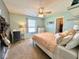Bright bedroom featuring a desk and chair, dresser, large window, and a comfortable bed, creating a relaxing space at 1234 Yellowstone Way, Franklin, IN 46131