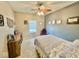 Neutral bedroom featuring carpet, a decorative ceiling fan, and a comfortably sized bed, creating a relaxing atmosphere at 1234 Yellowstone Way, Franklin, IN 46131