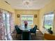Cozy breakfast nook with large windows and sliding doors to the backyard at 1234 Yellowstone Way, Franklin, IN 46131