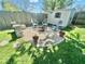 Charming stone firepit area with seating, perfect for cozy evenings and outdoor gatherings at 1234 Yellowstone Way, Franklin, IN 46131