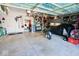 Spacious two car garage featuring gray cabinets, a workbench, and overhead bicycle storage at 1234 Yellowstone Way, Franklin, IN 46131