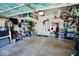 Organized garage with storage shelves, wall racks, and overhead storage to maximize space and keep items neatly arranged at 1234 Yellowstone Way, Franklin, IN 46131