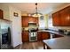 Modern kitchen with stainless appliances, hardwood floors, and ample storage space at 1234 Yellowstone Way, Franklin, IN 46131