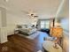 Large main bedroom suite featuring wood floors, chair railing, and an attached office area with windows at 1234 Yellowstone Way, Franklin, IN 46131