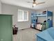 Bedroom featuring a bunk bed, desk and chair and gray carpet at 13494 Dallas Ln, Carmel, IN 46033