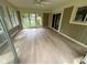 Well-lit sunroom with windows and a ceiling fan, perfect for relaxation at 13494 Dallas Ln, Carmel, IN 46033