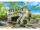 Stunning backyard featuring a multi-level deck, lush greenery, and a refreshing pool for relaxation at 13934 Salsbury Creek Dr, Carmel, IN 46032