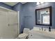 Well-lit bathroom featuring a glass shower, classic vanity, and framed mirror at 13934 Salsbury Creek Dr, Carmel, IN 46032