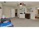 A spacious bedroom featuring a changing table, crib and access to an attached bathroom at 13934 Salsbury Creek Dr, Carmel, IN 46032