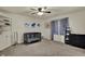 Neutral toned Bedroom with a black crib and grey accents and built-in bookshelves at 13934 Salsbury Creek Dr, Carmel, IN 46032