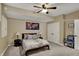 Finished basement bedroom featuring soft lighting and ample closet storage at 13934 Salsbury Creek Dr, Carmel, IN 46032