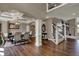 Dining room with wood floors and decorative columns at 13934 Salsbury Creek Dr, Carmel, IN 46032