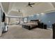 Spacious main bedroom featuring large windows, plush carpeting, and a luxurious feel at 13934 Salsbury Creek Dr, Carmel, IN 46032