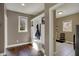 Convenient mudroom with built-in storage and hardwood floors for added style at 13934 Salsbury Creek Dr, Carmel, IN 46032