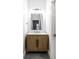 Bathroom features a modern vanity with marble countertop, updated faucet and modern lighting at 1451 N Grant Ave, Indianapolis, IN 46201