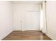 Bright bedroom features beautiful hardwood floors, closet and natural light from the window at 1451 N Grant Ave, Indianapolis, IN 46201