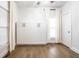 A versatile bedroom with hardwood floors, closet with a full-size wall bed at 1451 N Grant Ave, Indianapolis, IN 46201