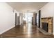 Open living room and kitchen with hardwood floors at 1451 N Grant Ave, Indianapolis, IN 46201