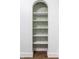 Elegant built-in shelving unit with designer wallpaper adds style to this home at 1451 N Grant Ave, Indianapolis, IN 46201