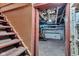 View of unfinished basement area from bottom of stairs at 1508 Monument St, Noblesville, IN 46060