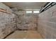 Unfinished cement block basement with small windows at 1508 Monument St, Noblesville, IN 46060