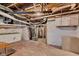 Unfinished basement with exposed ductwork and brick foundation at 1508 Monument St, Noblesville, IN 46060