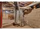 Unfinished basement with exposed ductwork and brick foundation at 1508 Monument St, Noblesville, IN 46060