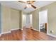 Bedroom with multiple doorways, laminate flooring, and neutrally painted walls for customization at 1508 Monument St, Noblesville, IN 46060