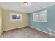 Empty bedroom featuring two windows and wall-to-wall carpeting at 1508 Monument St, Noblesville, IN 46060