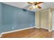 Bedroom featuring a wooden ceiling fan, laminate flooring, and neutrally painted walls for customization at 1508 Monument St, Noblesville, IN 46060