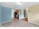 A brightly lit dining room next to the kitchen with view of appliances at 1508 Monument St, Noblesville, IN 46060