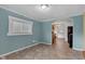 An empty dining room next to the kitchen with natural light coming through the window at 1508 Monument St, Noblesville, IN 46060
